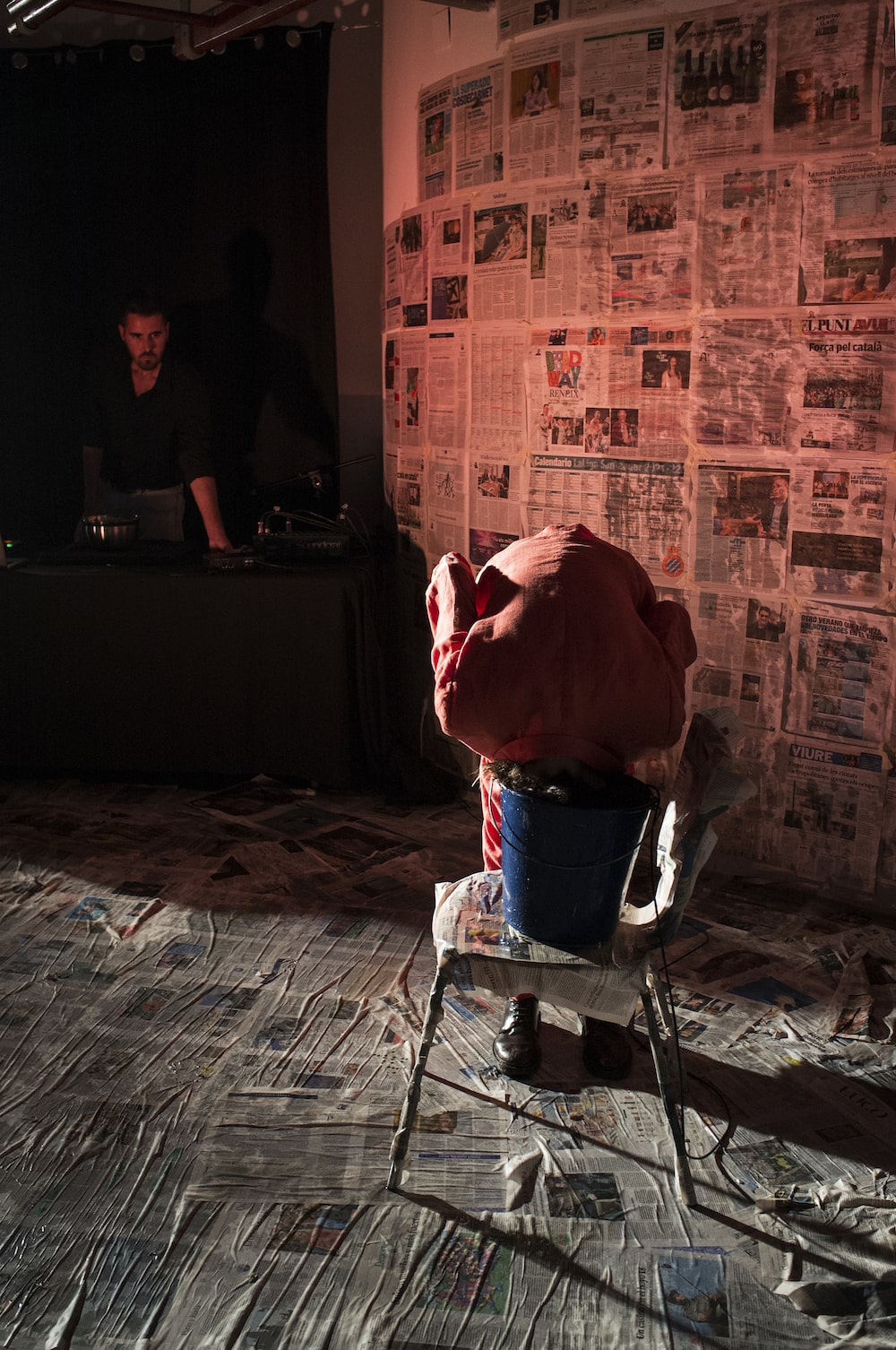 Scene from New Reality with Arnau Montserrat and Adriana de Montserrat, Adriana with head inside water cube